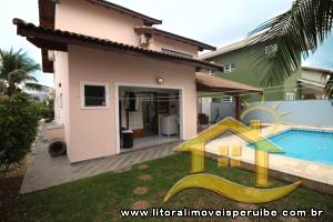 Casa - Sobrado com 3 dormitórios (sendo 2 suite(s)) a 400,00 metros praia.