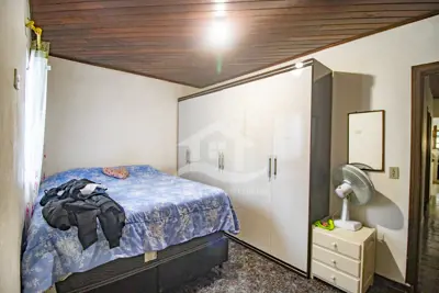 Casa - Térrea com 2 dormitórios (sendo 1 suite(s)) a 1700,00 metros praia.