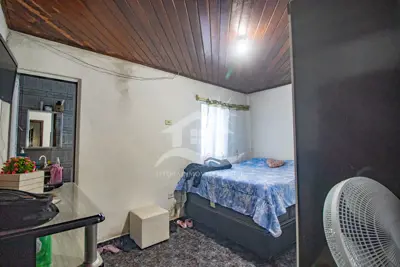 Casa - Térrea com 2 dormitórios (sendo 1 suite(s)) a 1700,00 metros praia.
