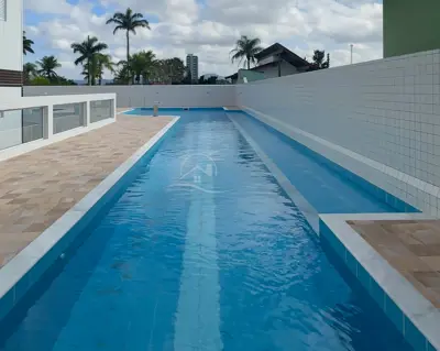 Apartamento - Amplo com 2 quartos (sendo 1 suite(s)) a 750,00 metros praia.