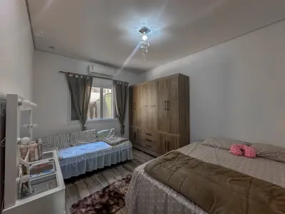 Terreno - Amplo com  quartos  a 400,00 metros praia.