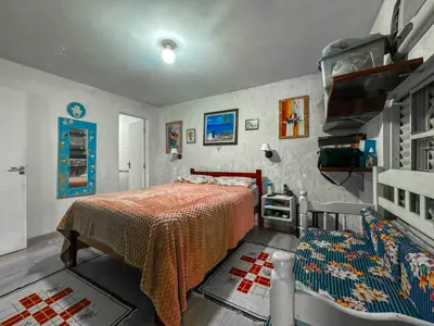 Casa - Térrea com piscina com 2 quartos (sendo 1 suite(s)) a 1700,00 metros praia.