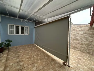 Casa - Térrea com Edícula com 2 quartos (sendo 1 suite(s)) a 1100,00 metros praia.