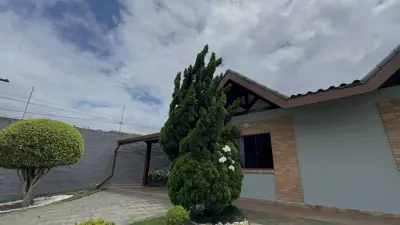 Casa - Térrea com piscina com 4 quartos (sendo 2 suite(s)) a 500,00 metros praia.