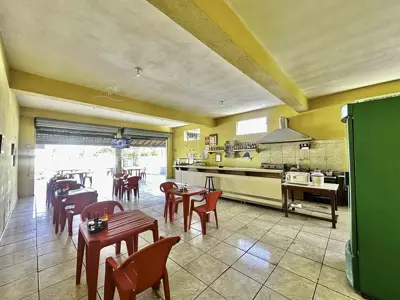 Comercial - Salão comercial + Edícula assobradada com  quartos  a 500,00 metros praia.