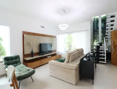 Casa - Sobrado com 4 quartos (sendo 4 suite(s)) a 1100,00 metros praia.