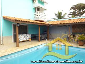 Casa - Sobrado com 3 dormitórios (sendo 3 suite(s)) a 500,00 metros praia.