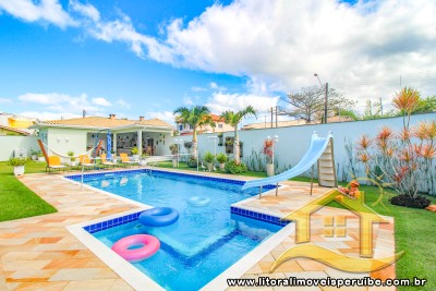 Casa - Térrea com 4 quartos (sendo 4 suite(s)) a 200,00 metros praia.