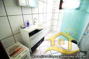 Casa - Térrea com piscina com 3 dormitórios (sendo 1 suite(s)) a 600,00 metros praia.