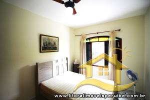 Casa - Térrea com piscina com 3 dormitórios (sendo 1 suite(s)) a 600,00 metros praia.