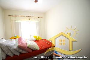 Casa - Térrea com piscina com 3 dormitórios (sendo 1 suite(s)) a 600,00 metros praia.