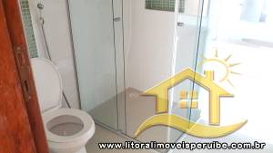 Apartamento - Edifício Nova Peruíbe com 2 dormitórios (sendo 2 suite(s)) a 400,00 metros praia.