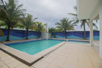 Casa - Sobrado Triplex com 7 dormitórios (sendo 7 suite(s)) a 50,00 metros praia.