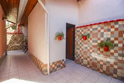 Casa - Térrea com 3 dormitórios (sendo 1 suite(s)) a 800,00 metros praia.