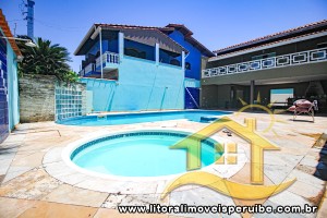 Casa - Sobrado com 5 dormitórios (sendo 4 suite(s)) a 70 metros praia.