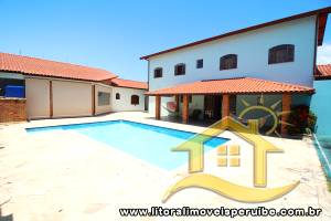 Casa - Térrea com 6 dormitórios (sendo 4 suite(s)) a 0,00 metros praia.