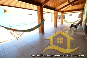 Casa - Térrea com 6 dormitórios (sendo 4 suite(s)) a 0,00 metros praia.