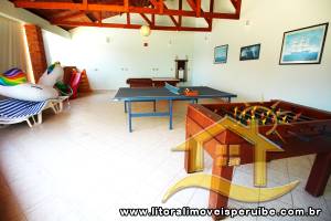 Casa - Térrea com 6 dormitórios (sendo 4 suite(s)) a 0,00 metros praia.