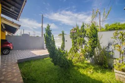 Casa - Térrea com 3 dormitórios (sendo 1 suite(s)) a 800,00 metros praia.