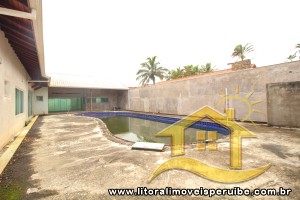 Casa - Térrea com 4 dormitórios (sendo 4 suite(s)) a 100,00 metros praia.
