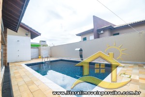 Casa - Sobrado com 4 dormitórios (sendo 4 suite(s)) a 0,00 metros praia.