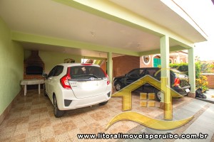 Casa - Térrea com piscina com 4 dormitórios (sendo 4 suite(s)) a 0,00 metros praia.