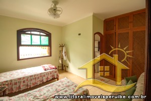 Casa - Térrea com piscina com 4 dormitórios (sendo 4 suite(s)) a 0,00 metros praia.