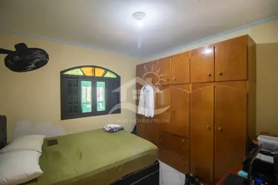 Casa - Térrea com 2 dormitórios (sendo 1 suite(s)) a 1000,00 metros praia.