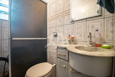 Casa - Térrea com 2 dormitórios (sendo 1 suite(s)) a 1000,00 metros praia.